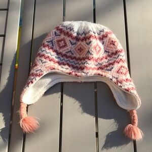 Old Navy size 6 to 12 months, pink hat with tassels